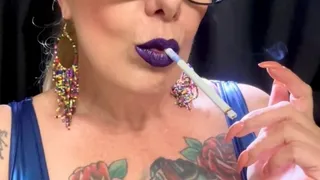 Chesterfield 100s - Dangling, Mouth Inhales and open mouth exhales, Deep Inhales, Nose exhales, Smoke rings, Coughing - Leather clothing, Heavy makeup, Purple lipstick, Long nails