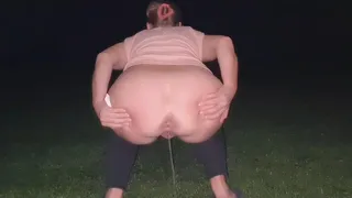 Sunset farts and pissing at night outdoors