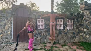 Black Dominatrix whipping white slave - Crucified slave