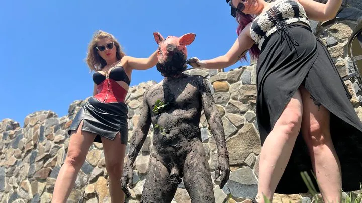 Dirty piggy humiliated in the mud - spiked boots worship