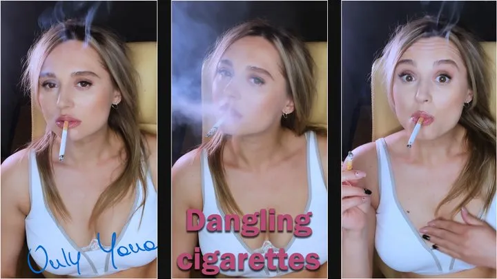 2 dangling cigarettes