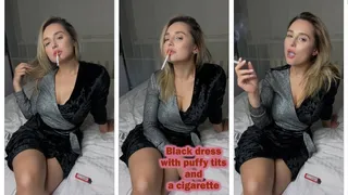 Black dress with puffy tits, legs and a cigarette