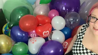 Popping a bed full of balloons
