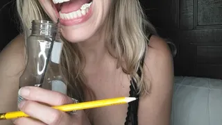 Chewing gum and sucking on pencil