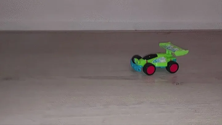 Sandra is crushing and destroying multiple toy cars with her sneakers