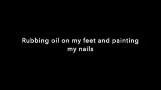 Painting my toe nails and rubbing oil on my feet