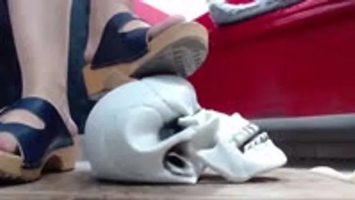 try to press a very hard skull in wooden sandals