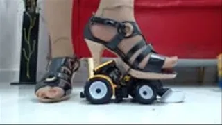 crushing a tractor in Nylons and 3 diffrent sexy Heels and Sandals