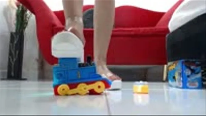 crushing Thomas the Train in sexy platform sandals and wooden Berkeman Sandals