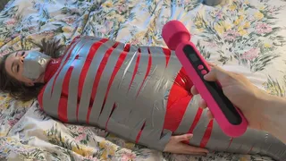 mummification with duct tape on girl wearing catsuit and denial