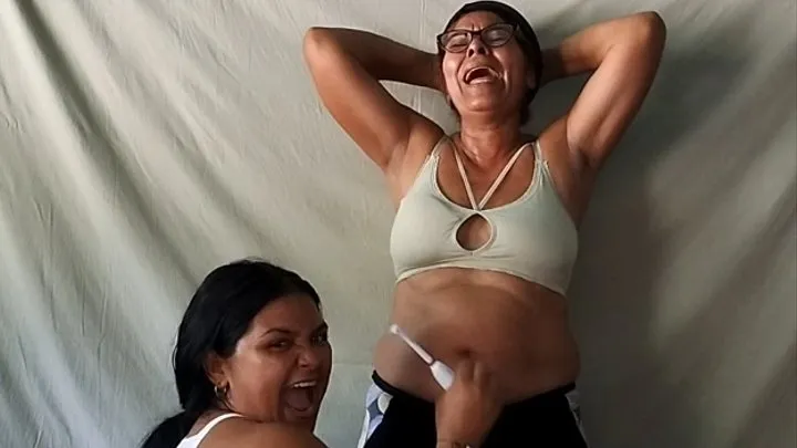 Tickle and massage in Gloria's navel