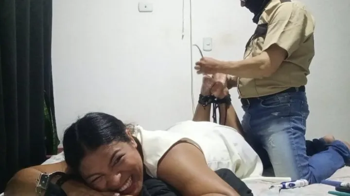 Ceci tickled on the soles by the police man