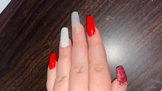 Long nails on a table and paper