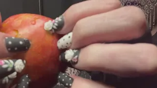 Harmony Pokes Holes in an Apple with Her Sharp Nails