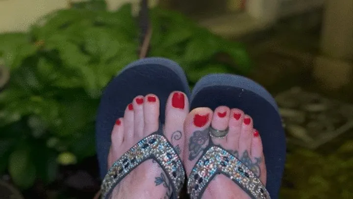 Tattoed Feet Wiggling out of my flip flops