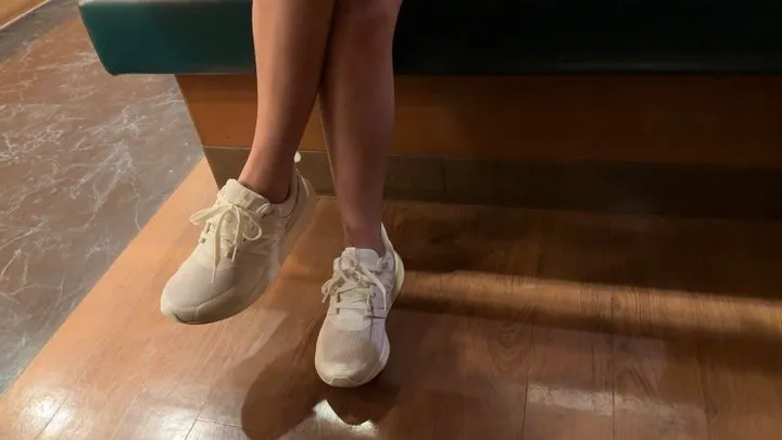 Under the Table Footage of Taylor's Feet