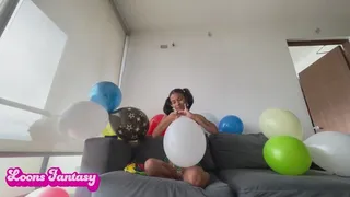 Akina blowing balloons in bikini