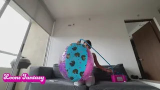 Akina blows up unicorn beach ball( )