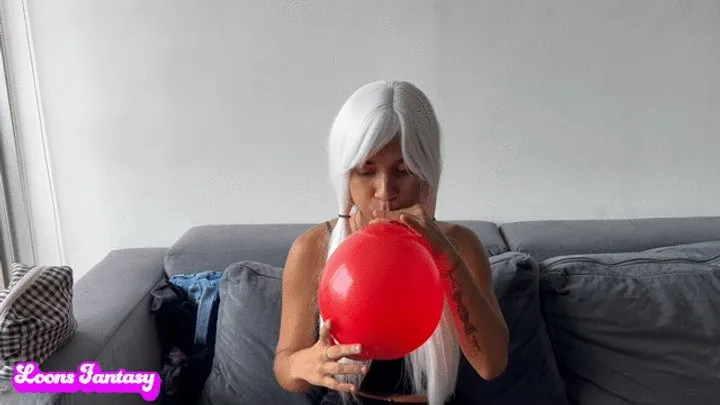 Akina blows 20 balloons