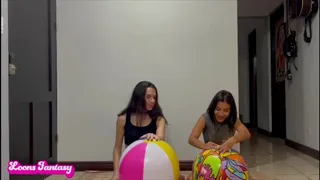 Akina and Owllete blow up and pops 2 beach balls