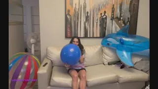 Owllete blows up and plays with blue punch balloon