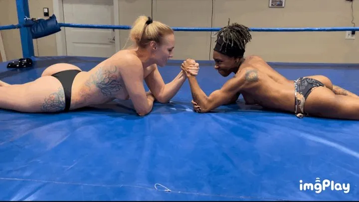 Part 1 Jolene Hexx vs Kirra Blaze in a topless competitive arm wrestling match