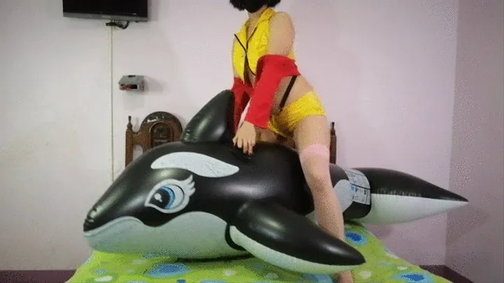 Faye Valentine rides an orca and deflates it