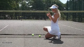 Miss Kiki taking a smoke break whilst playing tennis