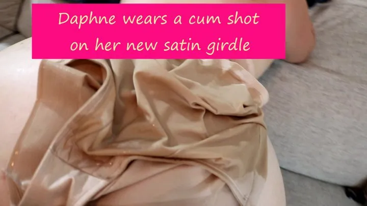 Daphne wears a cum shot on her new satin girdle