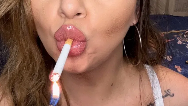 Sexy teasing close to the cam while I smoke in a row