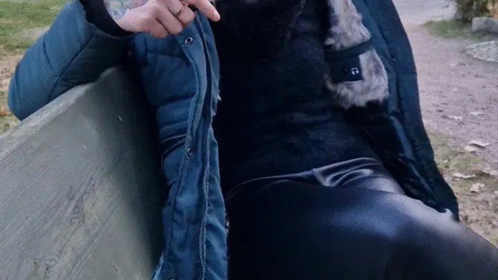 Smoking in Public with big Hood and Leather Leggings