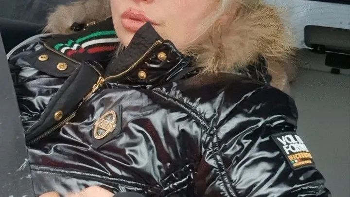 Carsmoking in big black Jacket