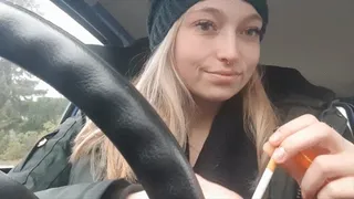 Car Smoking in Winter Jacket
