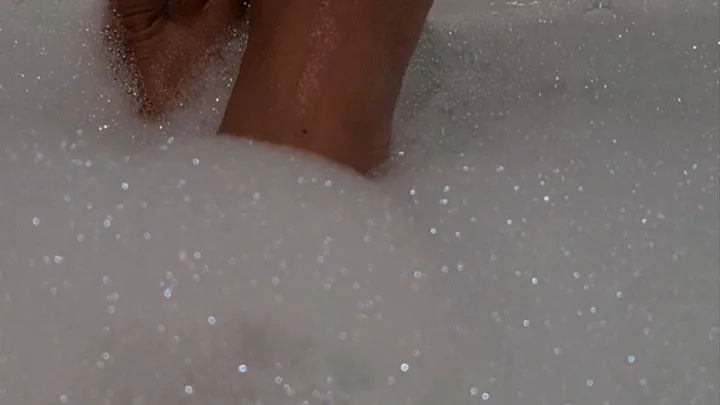 Playing with bubbles in the bath