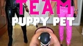 TWO EBONY DOMS IN LATEX TAG TEAM THEIR PUPPY PET'S ASS