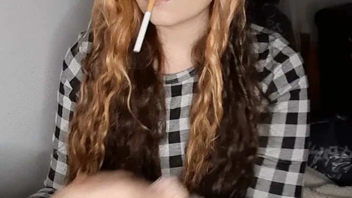 Smoking girl with long curly hair