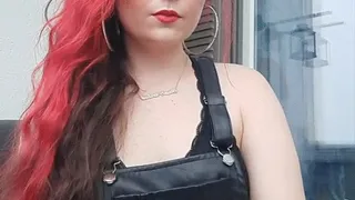 Smoking in a leather dress