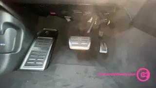 Woman driving Audi Q8