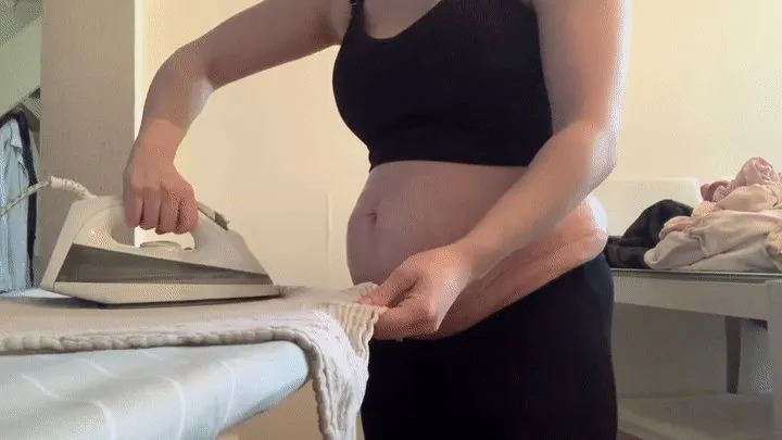 Ironing with my new pregnant belly out