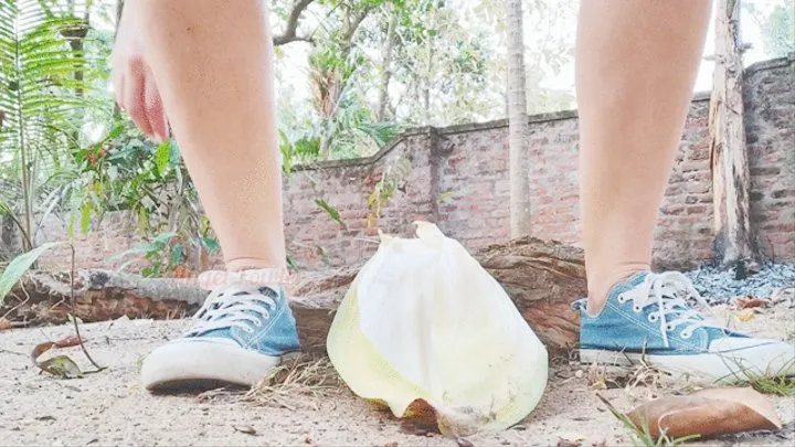 Pee in nature inside the Coconut flower shell