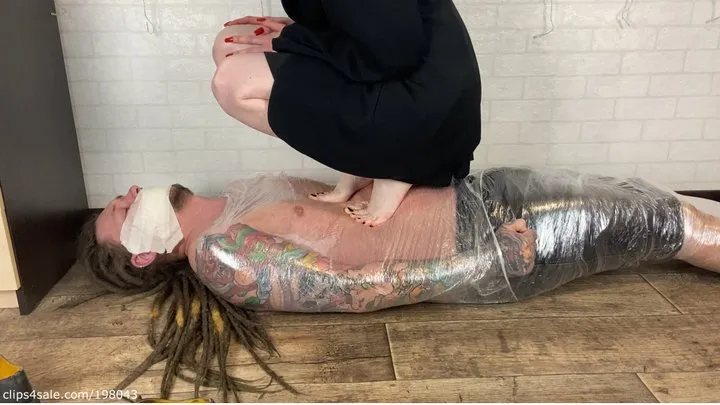 I'm trampling and humiliating My wrapped into plastic tape slave