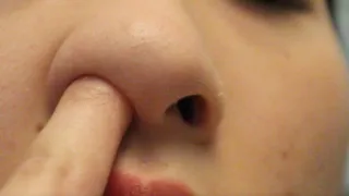 Aurora's Seductive Nose-Picking