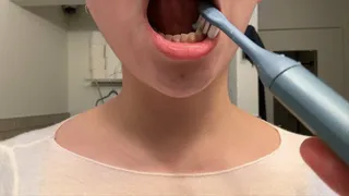Aurora Brushes Her Teeth, Foaming At The Mouth
