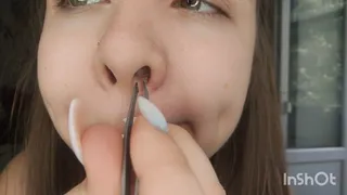 Plucking nose hair