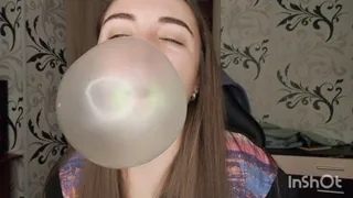 Angelica blows giant gum bubbles