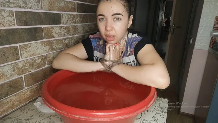 Compulsory dipping in a bowl of water