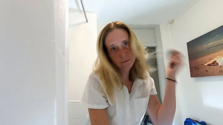 Danielle Brushing Her Hair In The Mirror 3