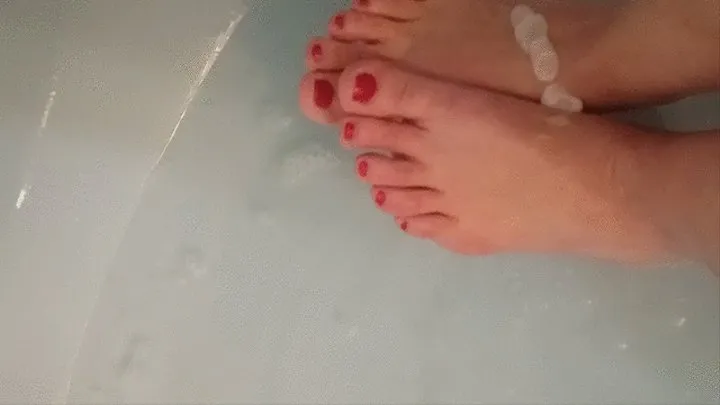 Soapy bare soles in the shower