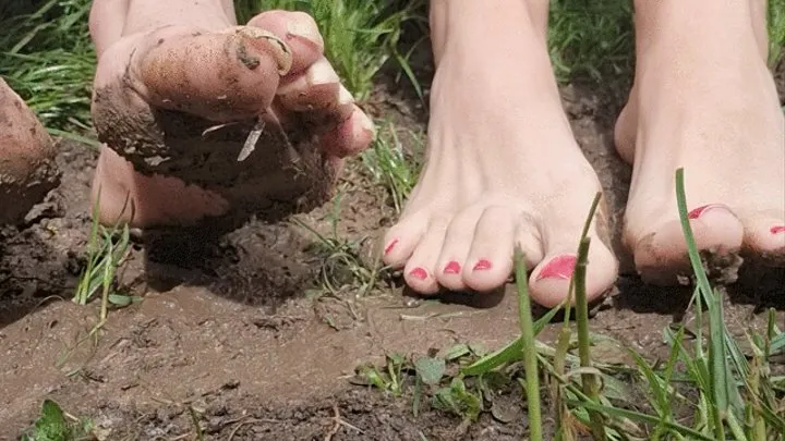 Goddess Samariel and Mistress Long Toenails foot worship in the mud