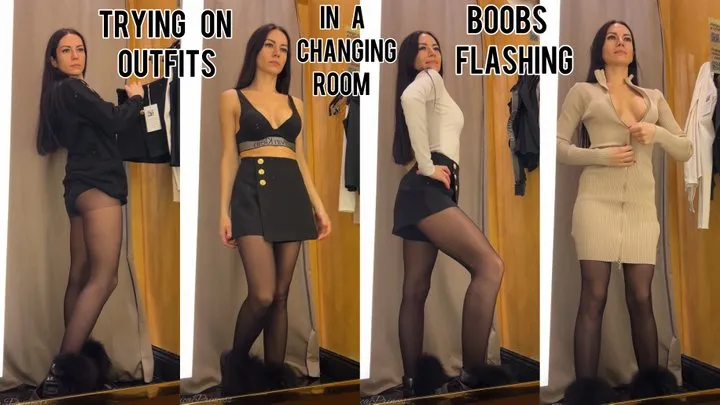 Trying on outfits in a changing room, boobs flashing